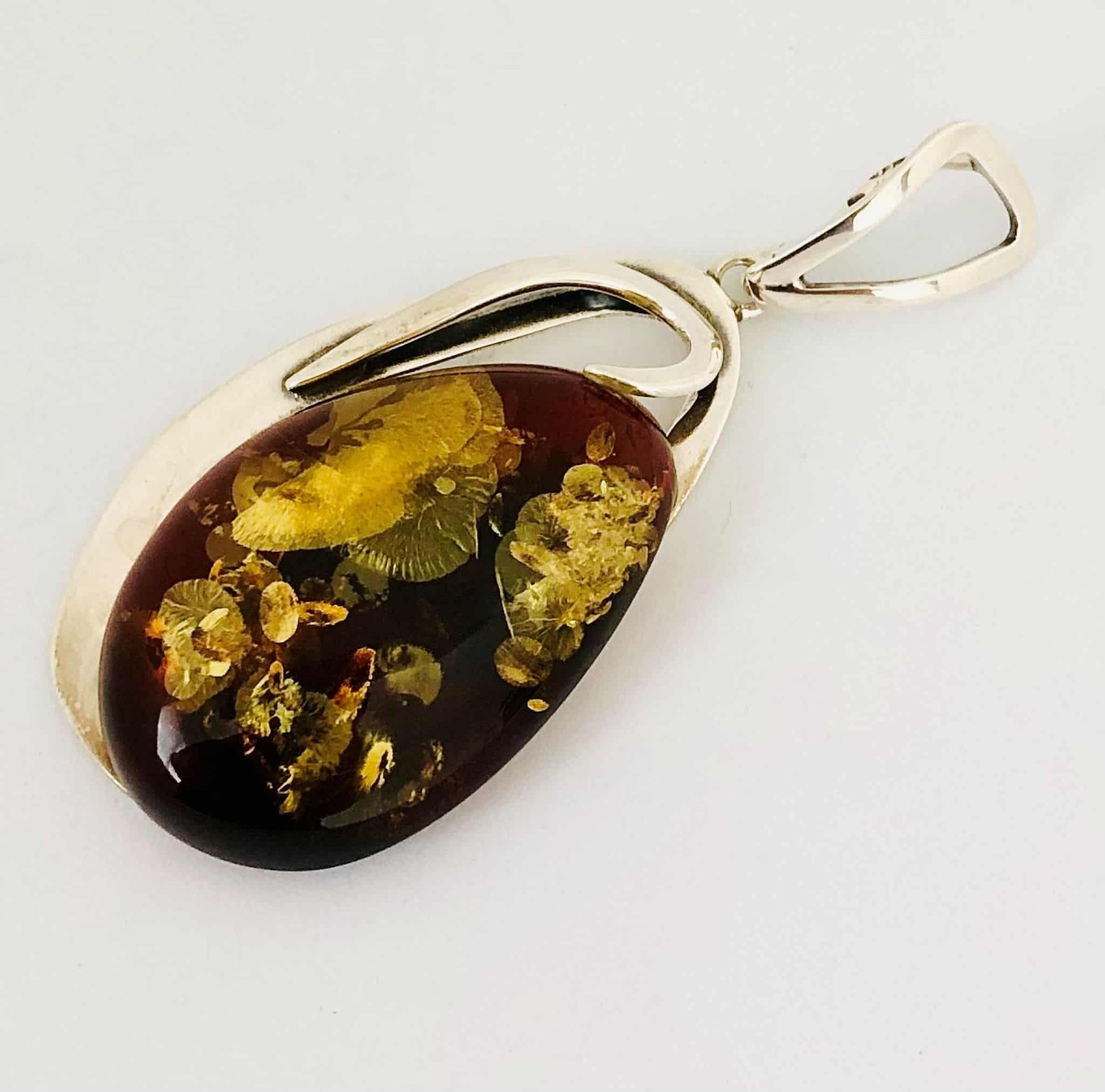 Beautifully Gifted Amber Pendant CHERRY TONES AMBER and silver pendant