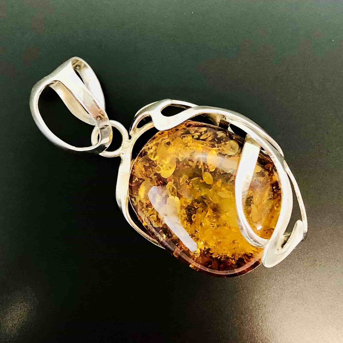 Beautifully Gifted Amber pendant MODERN BALTIC AMBER and silver pendant