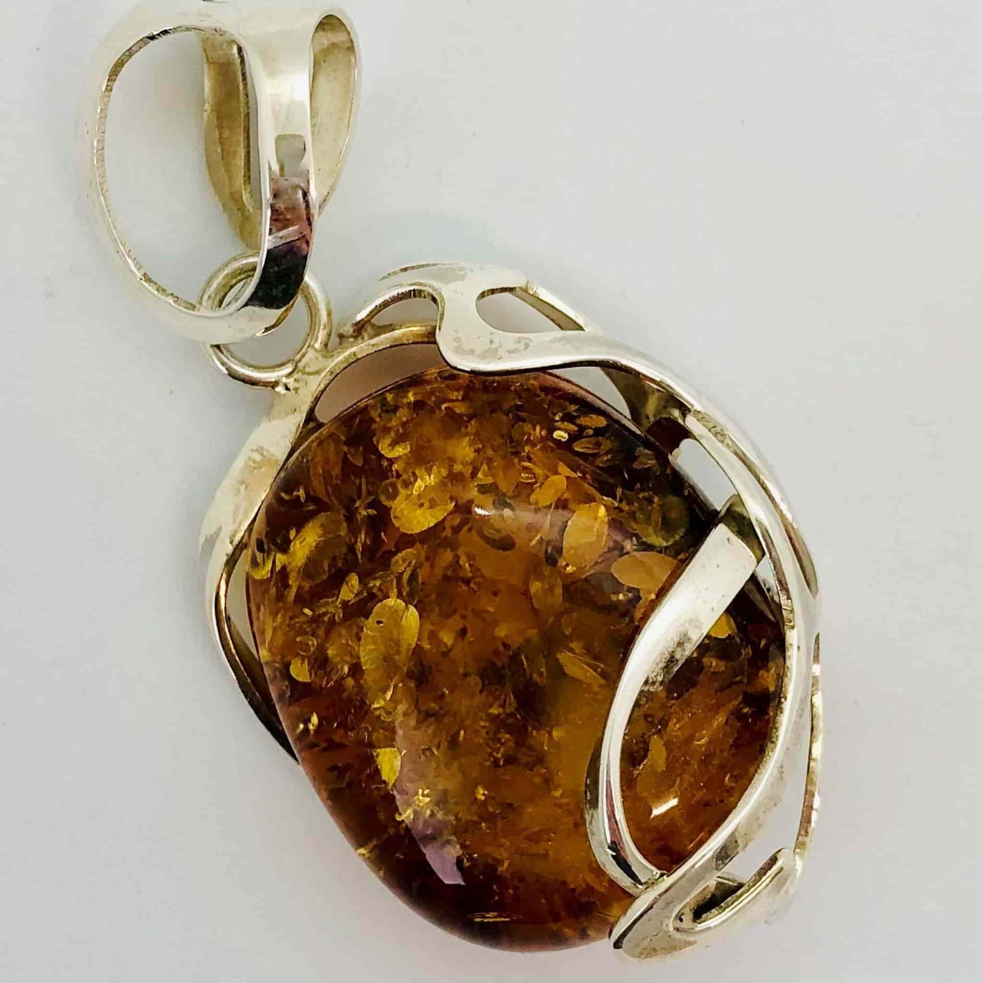 Beautifully Gifted Amber pendant MODERN BALTIC AMBER and silver pendant