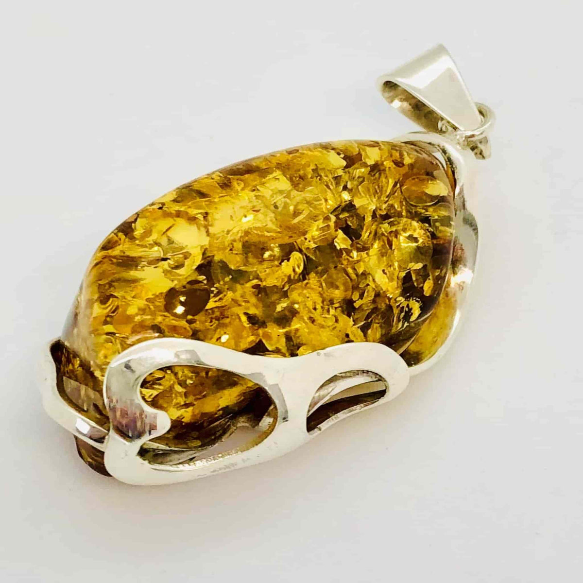 Beautifully Gifted Amber Pendant SHIMMERY BALTIC AMBER and silver pendant