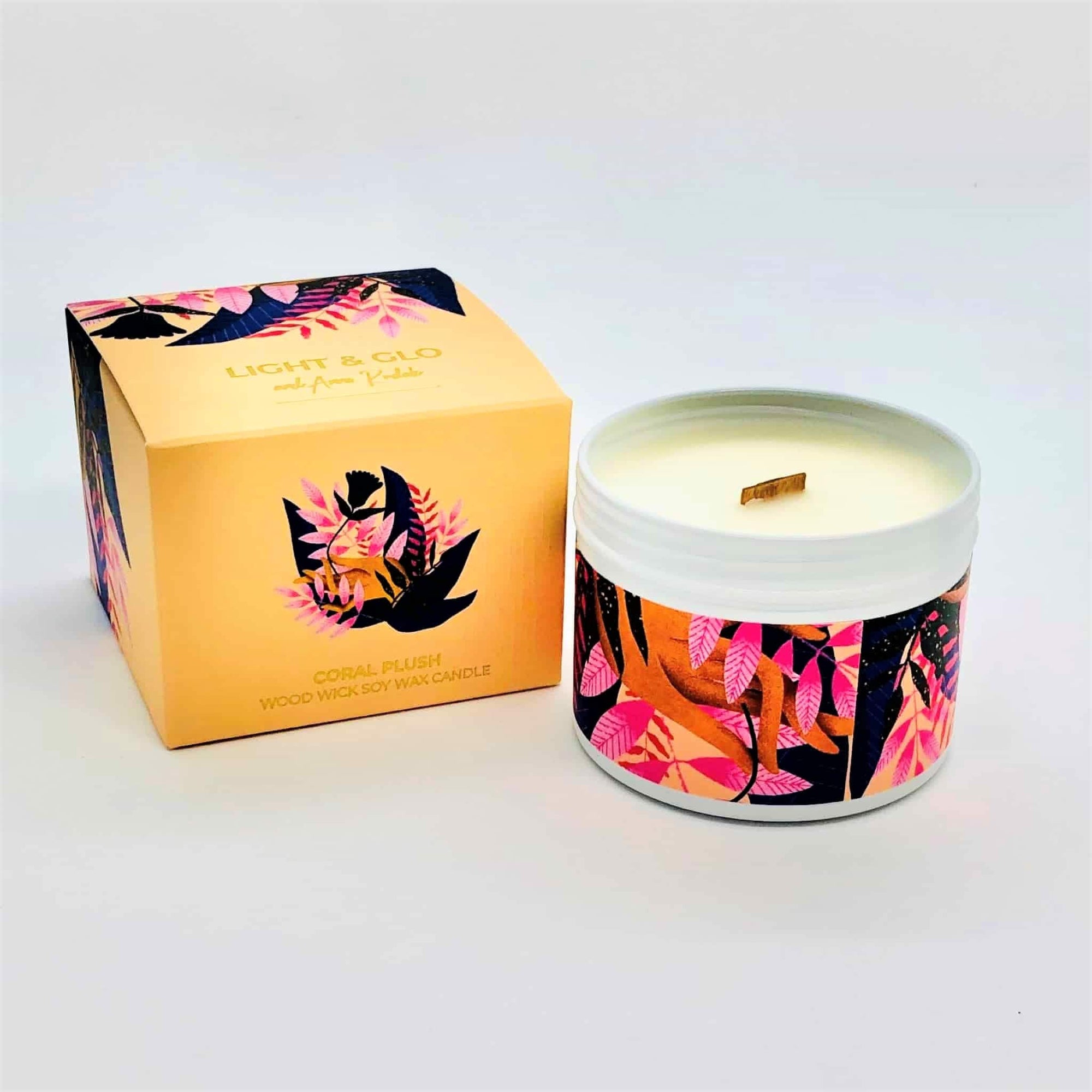 Pure soy wax candle with wood wick in handy white travel tin in Sweet Serenity fragrance. Compact size and both tin and box in soft pink and decorated in abstract floral motif of reds and orange.