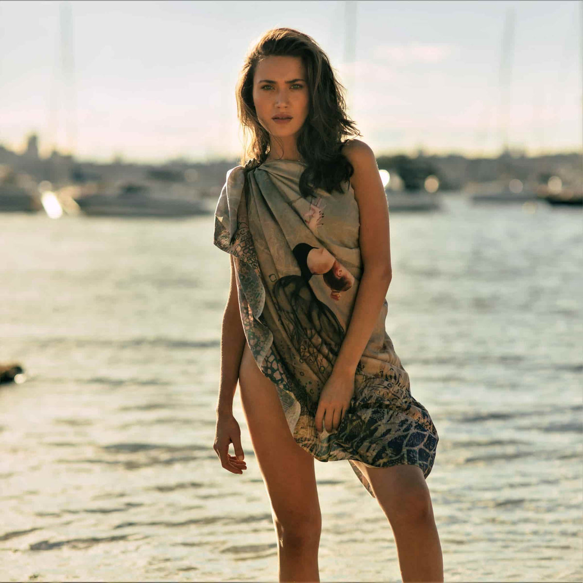 Break Free silk cotton sarong worn as one shoulder coverup at the beach.